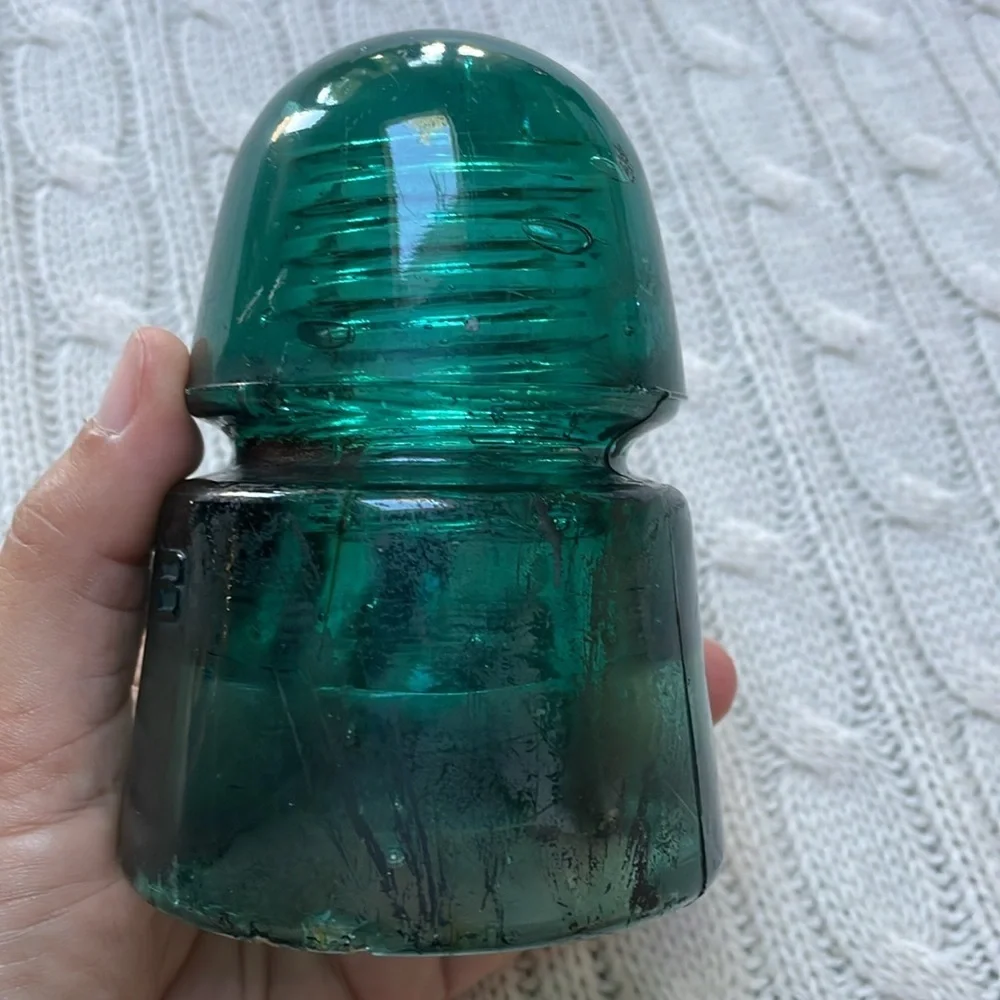 Antique glass insulator. Aqua teal glass. Threads inside stamped B on outside
